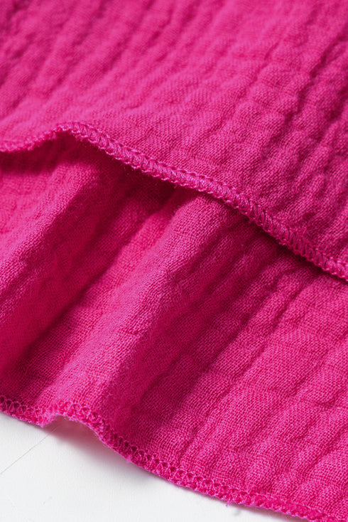 Solid Textured Tiered Ruffled Buttoned Long Sleeve Romper