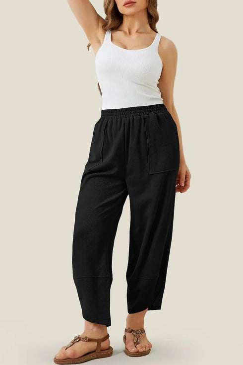 Solid Elastic Waist Asymmetrical Hem Loose Capri Pants