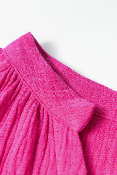 Solid Textured Tiered Ruffled Buttoned Long Sleeve Romper