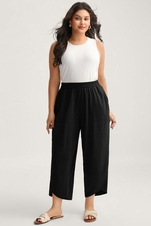 Solid Elastic Waist Asymmetrical Hem Loose Capri Pants