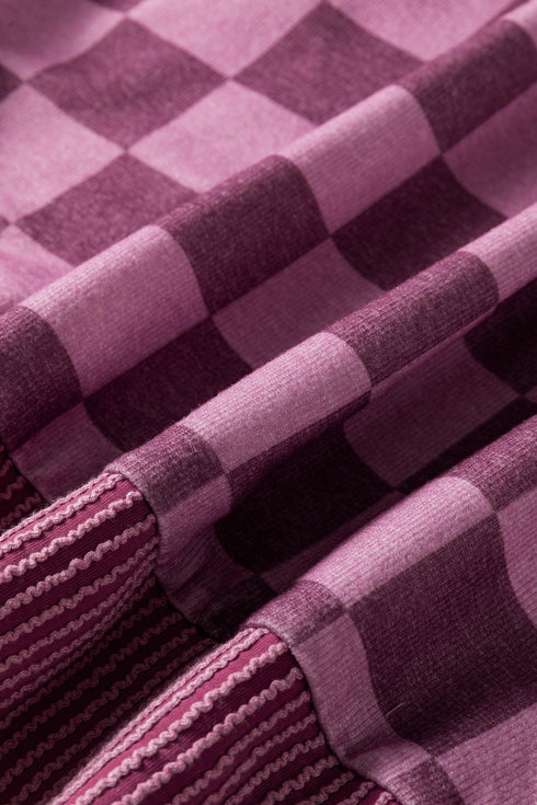 Bold Checkerboard Print Ribbed Trim Pullover Top