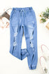 Distressed Pocketed Stretch Denim Jogger Jeans