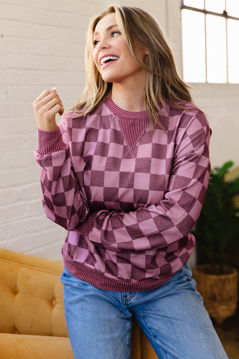 Bold Checkerboard Print Ribbed Trim Pullover Top