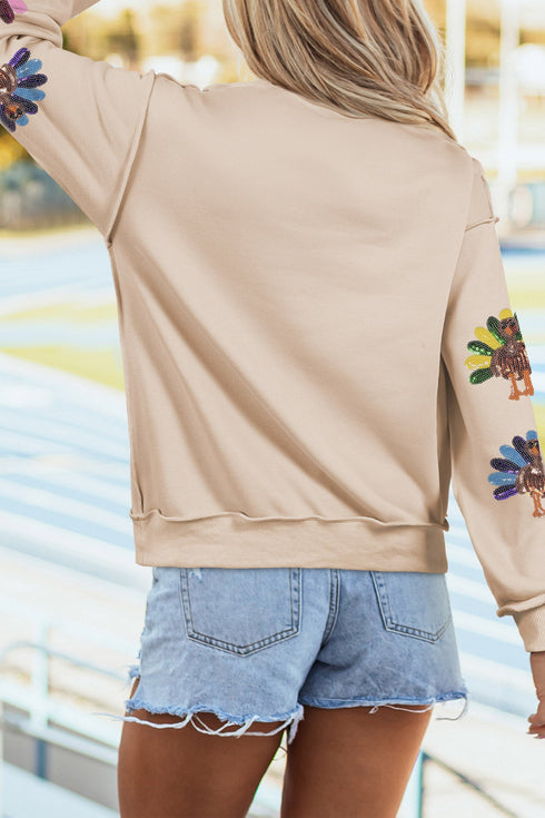 Sequined Turkey Graphic Exposed Seam Mock Neck Sweatshirt
