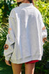 Sequin Pumpkin Face Bow Exposed Seam Pullover Sweatshirt