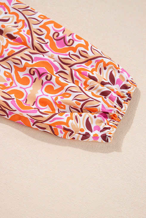 Abstract Printed Long Sleeve Tied Neckline Mini Dress