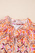 Abstract Printed Long Sleeve Tied Neckline Mini Dress