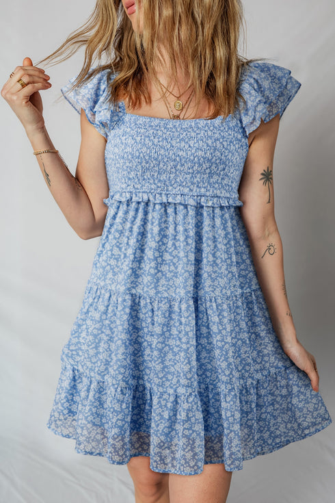 All Over Print Smocked Flutter Sleeve Tiered Floral Dress