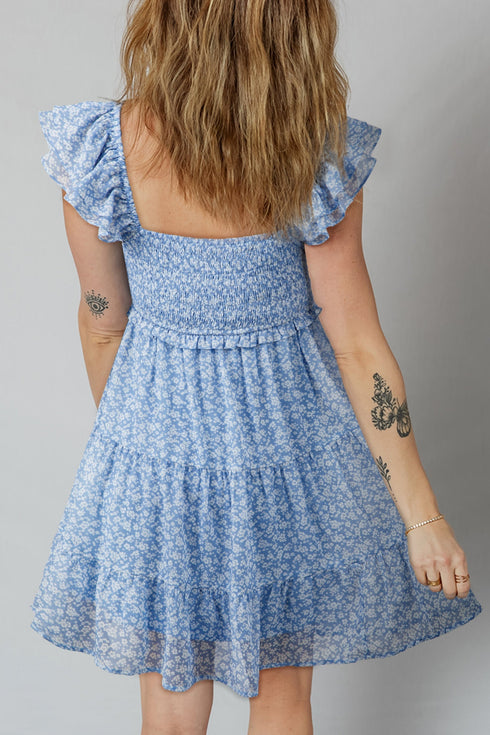 All Over Print Smocked Flutter Sleeve Tiered Floral Dress