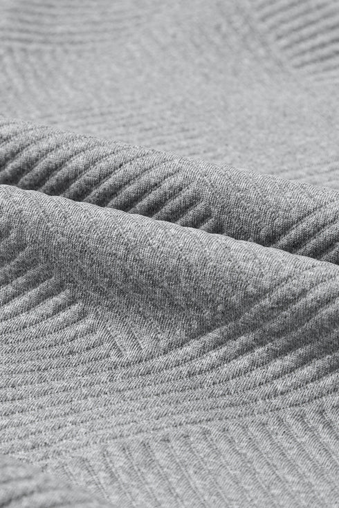 Asymmetrical Button Neck Geometric Textured Knit Pullover
