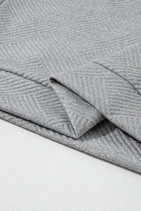 Asymmetrical Button Neck Geometric Textured Knit Pullover