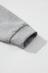 Asymmetrical Button Neck Geometric Textured Knit Pullover