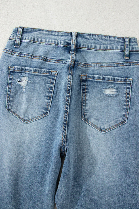 Distressed Open Knee Raw Hem Fit Flare Jeans