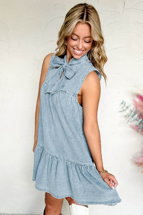 Charming Bow Tie Neck Sleeveless Ruffled Hem Chambray Mini Dress
