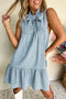 Charming Bow Tie Neck Sleeveless Ruffled Hem Chambray Mini Dress