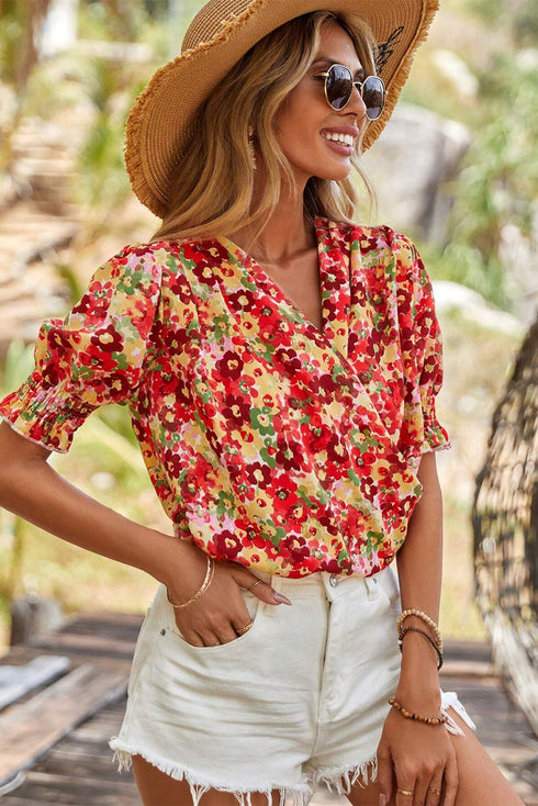 Cheerful Floral Print Faux Wrap Smocked Cuff Half Sleeve Top
