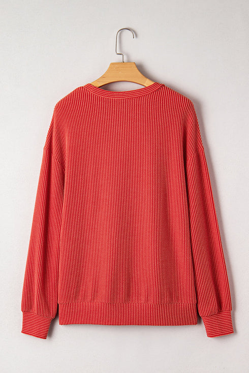 Corded Textured Graphic Print Long Sleeve Pullover Top