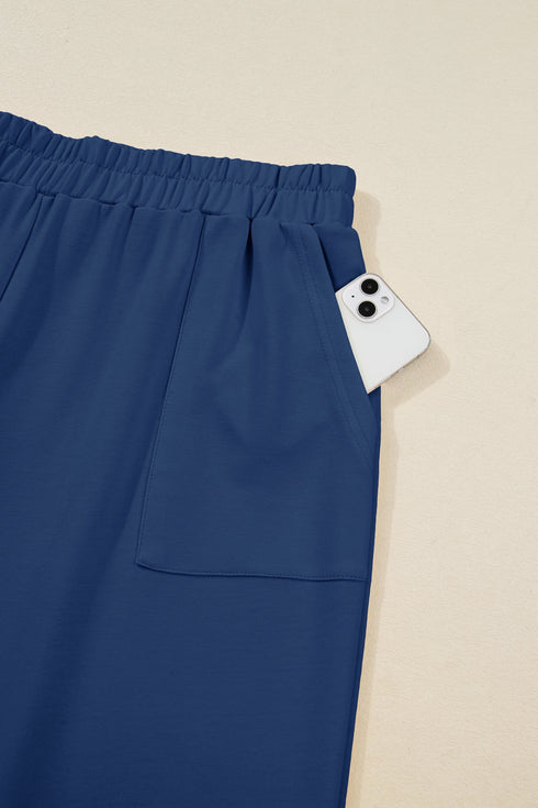 Solid Elastic Waist Asymmetrical Hem Loose Capri Pants