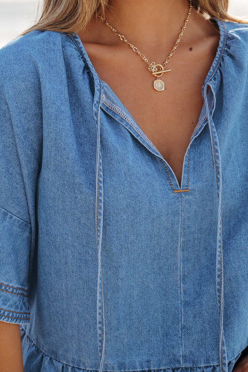 Dusk Blue Denim Ruffled Sleeve Lace up Front Peplum Top