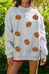 Sequined Pumpkin Graphic Exposed Seam Mock Neck Sweatshirt