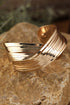 Elegant Textured Metal Crossover Cuff Bracelet