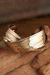 Elegant Textured Metal Crossover Cuff Bracelet