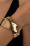 Elegant Textured Metal Crossover Cuff Bracelet