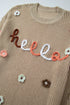 Embroidered Script And Floral Long Sleeve Knit Sweater
