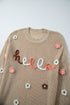 Embroidered Script And Floral Long Sleeve Knit Sweater