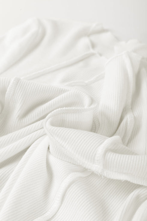 Exposed Seam Ribbed Knit Slim Fit Long Sleeve Top