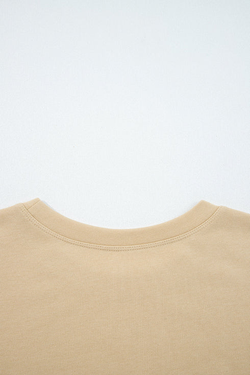 Exposed Seam Textured Patchwork Drop Shoulder Long Sleeve Top