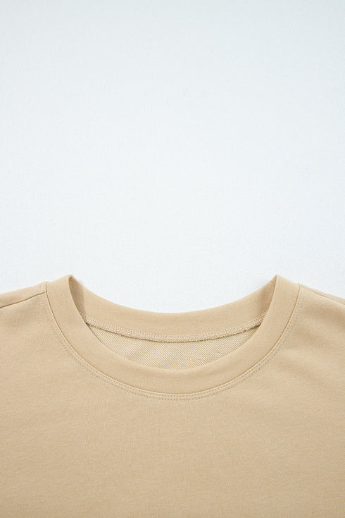 Exposed Seam Textured Patchwork Drop Shoulder Long Sleeve Top