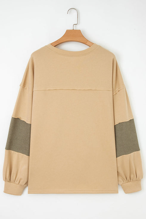 Exposed Seam Textured Patchwork Drop Shoulder Long Sleeve Top