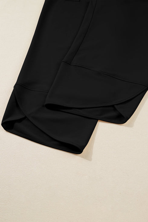 Solid Elastic Waist Asymmetrical Hem Loose Capri Pants