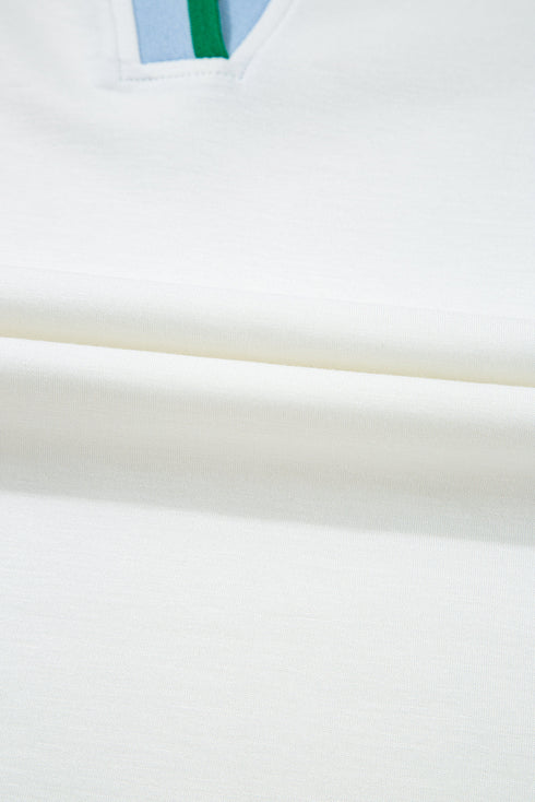 Feminine Charm Collared V Neck Blouse With Playful Ruffled Sleeves And Contrast Detail