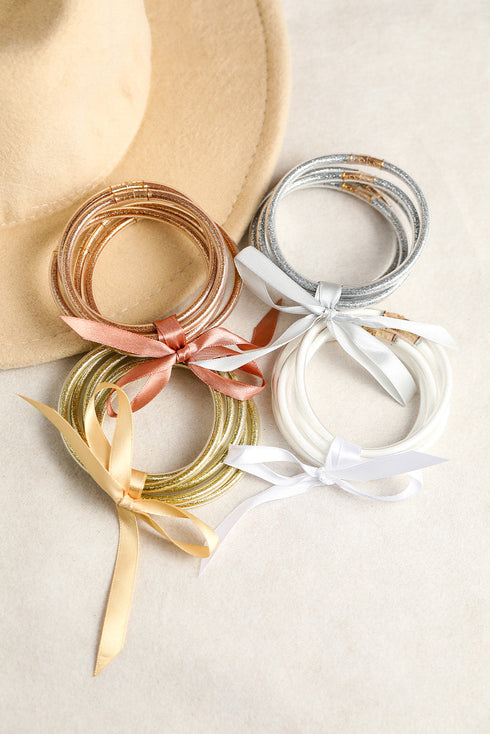 Five Piece Glitter Jelly Bow Ribbon Bracelet Set