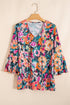 Floral Print Three Quarter Flare Sleeve Tie Neck Blouse