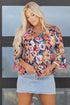 Floral Print Three Quarter Flare Sleeve Tie Neck Blouse