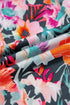 Floral Print Three Quarter Flare Sleeve Tie Neck Blouse