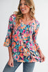 Floral Print Three Quarter Flare Sleeve Tie Neck Blouse