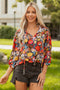 Floral Print Three Quarter Puff Sleeve Tie Neck Blouse