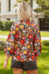 Floral Print Three Quarter Puff Sleeve Tie Neck Blouse