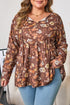 Floral Textured Tied Neck Long Sleeve Babydoll Blouse