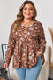 Floral Textured Tied Neck Long Sleeve Babydoll Blouse
