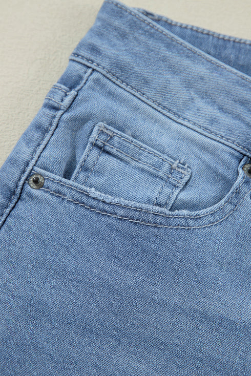 High Rise Asymmetric Button Zip Fly Distressed Jeans