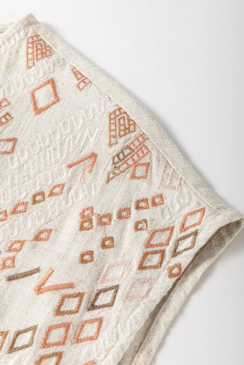 Jet Stream Geometric Embroidered Short Sleeve Tassel Tied V Neck Blouse