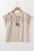 Jet Stream Geometric Embroidered Short Sleeve Tassel Tied V Neck Blouse