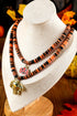 Layered Beaded Skull And Pumpkin Pendant Necklace
