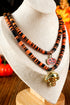 Layered Beaded Skull And Pumpkin Pendant Necklace