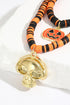 Layered Beaded Skull And Pumpkin Pendant Necklace